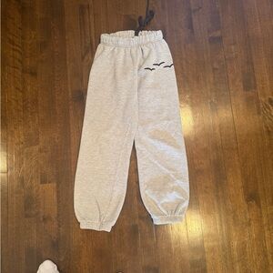 Stylish Gray Jogger Pants with Bird Design